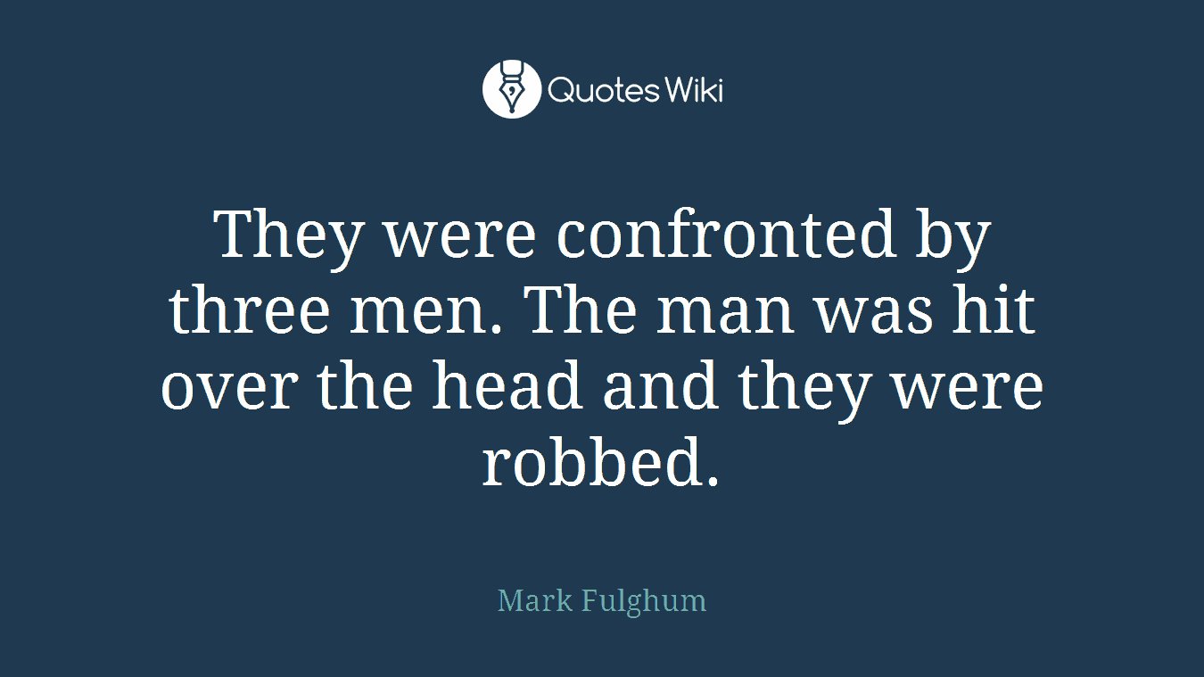 They were confronted by three men. The man was hit over the head and they were robbed.